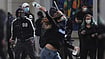 In Albania, Student Protests Turn Violent As Calls For PM Rama’s Resignation Grow AP Photo/Hameraldi Agolli : A young protester throws a plastic bottle towards riot police during clashes in Tirana, Albania