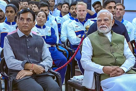 In this screengrab from a video posted on Oct. 15, 2026, Prime Minister Narendra Modi and Union Sports and Youth Affairs Minister Mansukh Mandaviya during an interaction programme with the athletes of the Asian Games 2026, in New Delhi.
