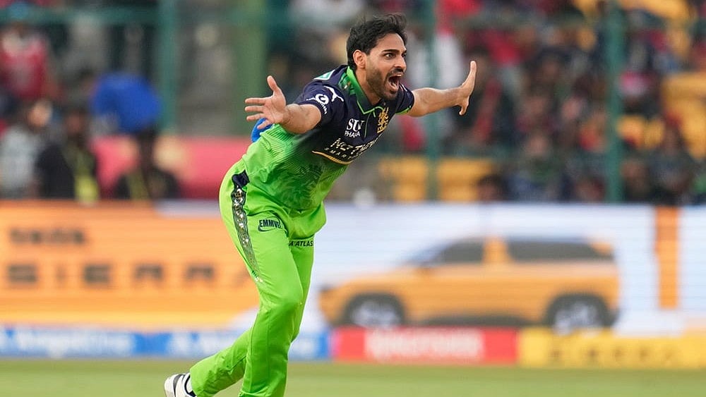 Royal Challengers Bengaluru's Bhuvneshwar Kumar appeals for the wicket of Delhi Capitals' Pathum Nissanka during the Indian Premier League cricket match between Royal Challengers Bengaluru and Delhi Capitals in Bengaluru. - | Photo: AP/Aijaz Rahi
