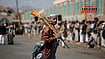  | AP Photo/Osamah Abdulrahman : A Houthi supporter carries a rifle while attending an armed tribal rally in Sanaa, Yemen