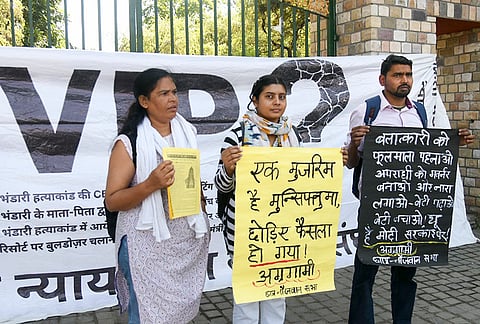 Uttarakhand Mahila Manch and Ankita Nyay Yatra Sanyukt Sangharsh Manch members stage a protest outside Gandhi Park, demanding that the appointment of Dushyant Kumar Gautam as Sikkim Governor be put on hold until the alleged probe into the Ankita Bhandari murder case is completed, in Dehradun, Uttarakhand.