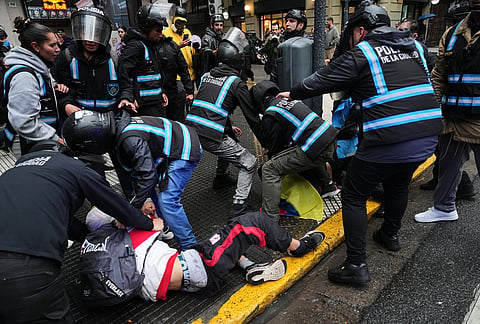 Demonstrators are detained during an anti-government protest in Buenos Aires, Argentina, Thursday, Oct. 15, 2026. 
