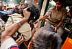 In Photos | Gyanesh Kumar Resignation Protests Spread From Delhi To Hyderabad, Srinagar | Photo: PTI/Ravi Choudharay : Police personnel detain a demonstrator during a protest march, demanding resignation of Chief Election Commissioner (CEC) Gyanesh Kumar, amid a demonstration organized by Justice Morcha, in New Delhi, Saturday, Oct. 17, 2026.
