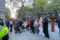 Day In Pics: October 17, 2026 | Photo: PTI : Members of pro-government diaspora groups hold a counter-protest in support of Prime Minister Narendra Modi and the Indian government, outside the High Commission of India, in London. The demonstration was held in response to a protest by student groups demanding electoral reforms and accountability in India.