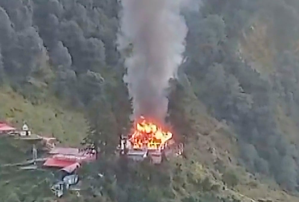 Kumaon Garhwal wooden temple fire
