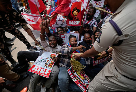 Police detain student activists during a protest demanding the resignation of India's election chief Gyanesh Kumar in Hyderabad, Saturday, Oct. 17, 2026. 
