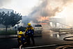 California Wildfires In Photos: Firefighters Battle Norte Fire As Flames Threaten Homes | Photo: Paul Bersebach/The Orange County Register via AP : Firefighters work to save structures on Via La Mirada during the Norte fire in San Clemente, California on Friday, Oct. 16, 2026.