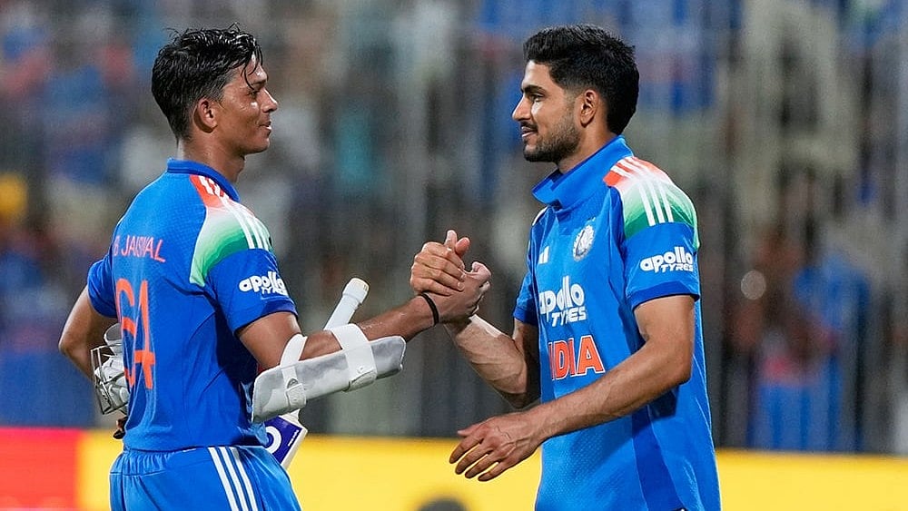India's Yashasvi Jaiswal is congratulated by captain Shubman Gill as he leaves the field after India won the third ODI cricket match against Afghanistan in Chennai. - | Photo: AP/Mahesh Kumar A.