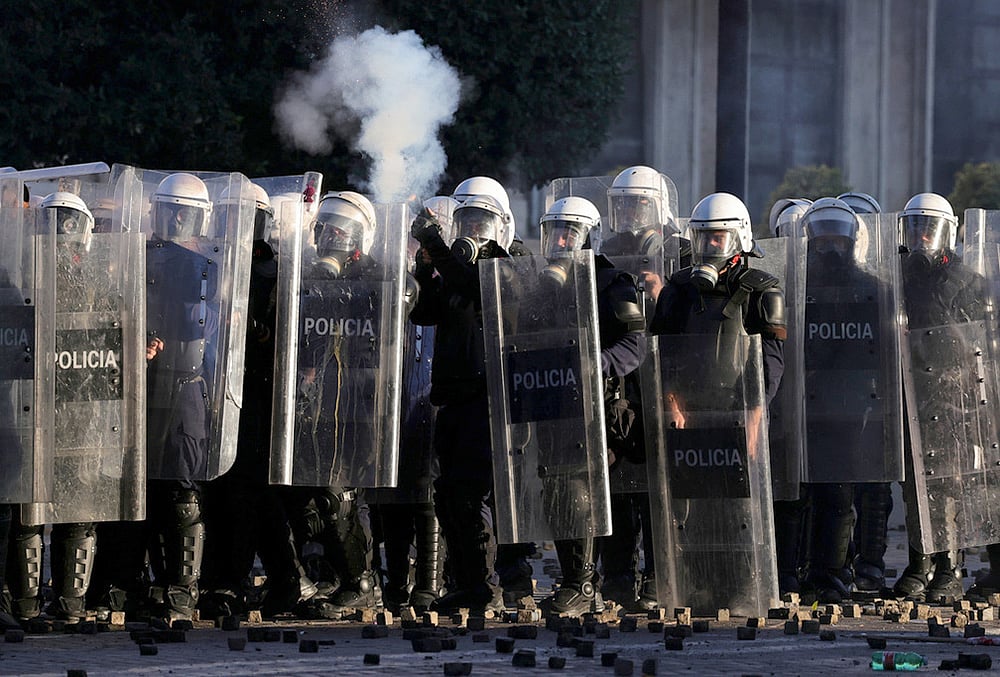 Albania riot police tear gas pictures