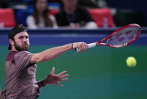 United States' Tommy Paul returns a ball to Russia's Daniil Medvedev during the men's singles quarterfinals match at the Shanghai Masters tennis tournament in Shanghai, China, Friday, Oct. 16, 2026. 
