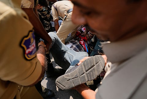 Police detain student activists during a protest demanding the resignation of India's election chief Gyanesh Kumar in Hyderabad Saturday, Oct. 17, 2026. 
