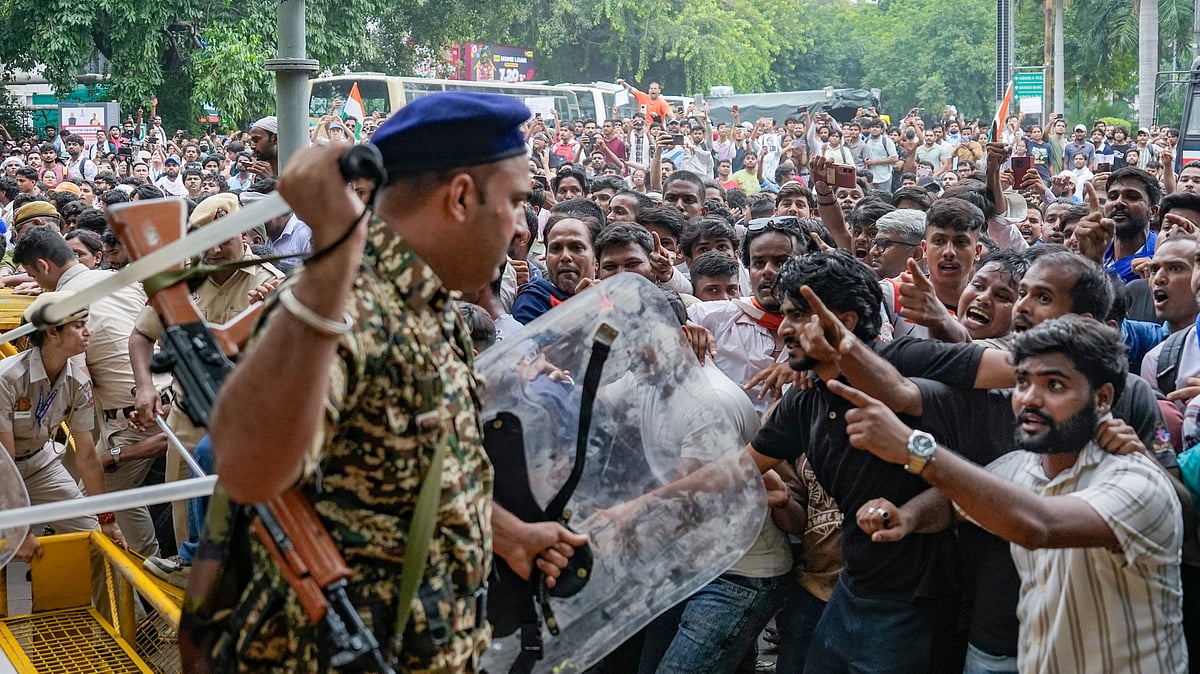 Security personnel and Cockroach Janata Party (CJP) supporters in New Delhi, July 20, 2026. - File Photo | Money Sharma