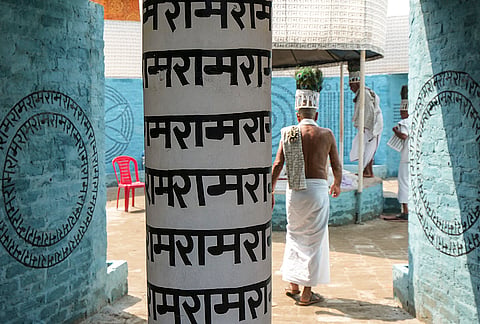 A member of the Ramnami community, a Hindu devotional sect from Chhattisgarh, at a community puja pandal during the ongoing 'Durga Puja' festival, in Kolkata, West Bengal, Saturday, Oct. 17, 2026.
