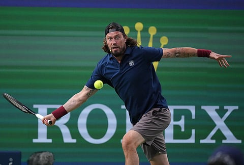 Marat Safin plays at the Roger and Friends Celebrity Doubles Match with Former tennis players Roger Federer, of Switzerland, Dinara Safina, of Russia and Chinese celebrities during the Shanghai Masters tennis tournament in Shanghai, China, Friday, Oct. 16, 2026. 
