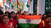 In Photos: Ankita Bhandari Murder Case: Mahila Congress Protests | Photo: PTI/Karma Bhutia : All India Mahila Congress President Alka Lamba leads a protest march demanding justice for the 2022 murder of 19-year-old Ankita Bhandari in Uttarakhand, at Connaught Place, in New Delhi, Sunday, Oct. 18, 2026.
