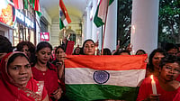 In Photos: Ankita Bhandari Murder Case: Mahila Congress Protests | Photo: PTI/Karma Bhutia : All India Mahila Congress President Alka Lamba leads a protest march demanding justice for the 2022 murder of 19-year-old Ankita Bhandari in Uttarakhand, at Connaught Place, in New Delhi, Sunday, Oct. 18, 2026.