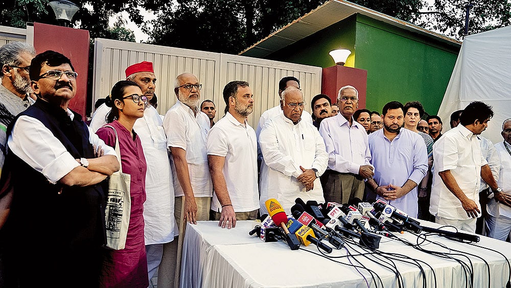 Opposition leaders gather for a press briefing outside Rahul Gandhi’s residence