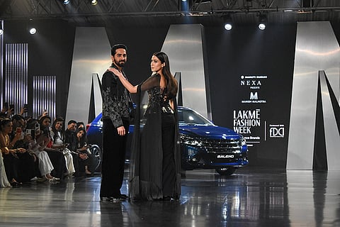 Actors Aayushman Khurana and Sara Ali Khan showcase creations of designer Manish Malhotra during Lakme Fashion Week, in New Delhi.