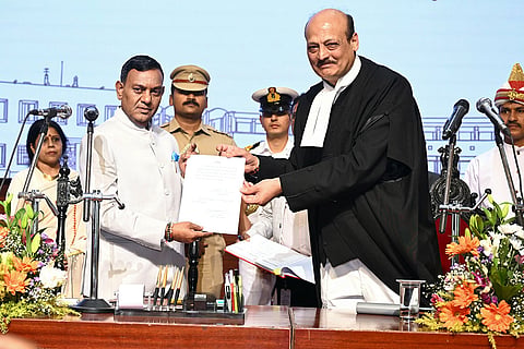 In this image posted on Oct. 18, 2026, Chief Justice of the Odisha High Court, Justice Harish Tandon, administers the oath of office to Brajmohan Ram as the Governor of the state.