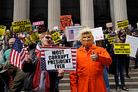 In Photos: ‘No Kings’ Protesters Rally Across US Ahead Of Midterms | Photo: AP/Madison Swart : Protesters gather for a "No Kings" rally on Saturday, Oct. 17, 2026, in New York.