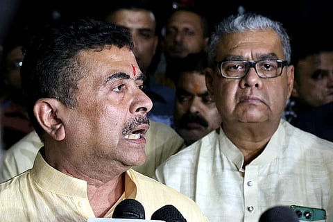 West Bengal CM Suvendu Adhikari speaks to the media after visiting the Kolkata Medical College and Hospital, where the victims of stampede at the Chorebagan Durga Puja pandal were taken following a crowd surge amid rain on Saturday evening, the day of Maha Saptami, in Kolkata, early Sunday, Oct. 18, 2026.