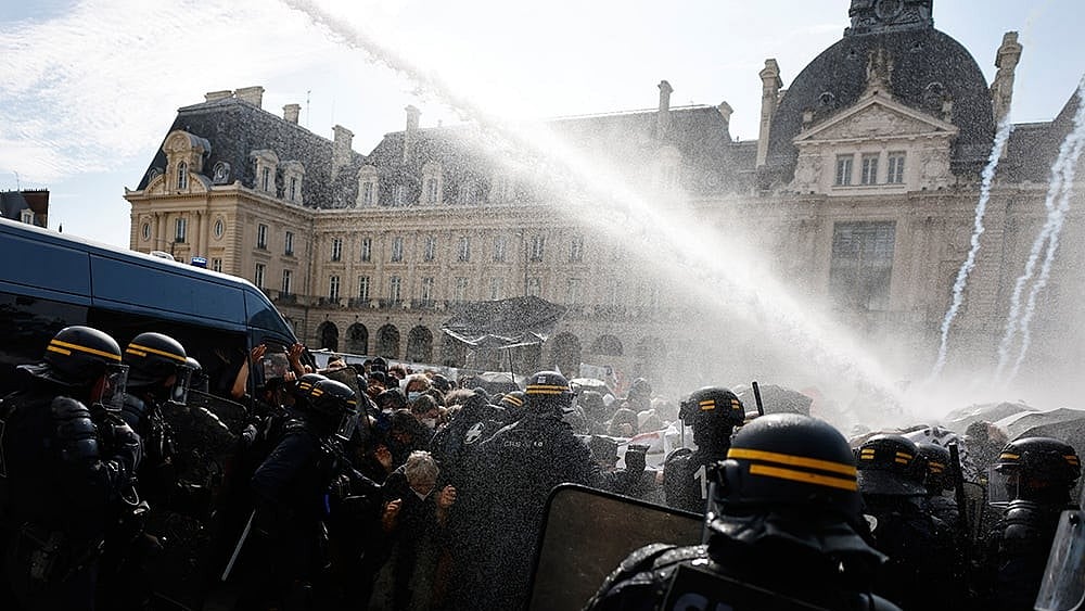 Riot police use a water cannon as they face students during a protest against under-resourced schools, in Rennes, western France
 - | Photo: AP/Jeremias Gonzalez