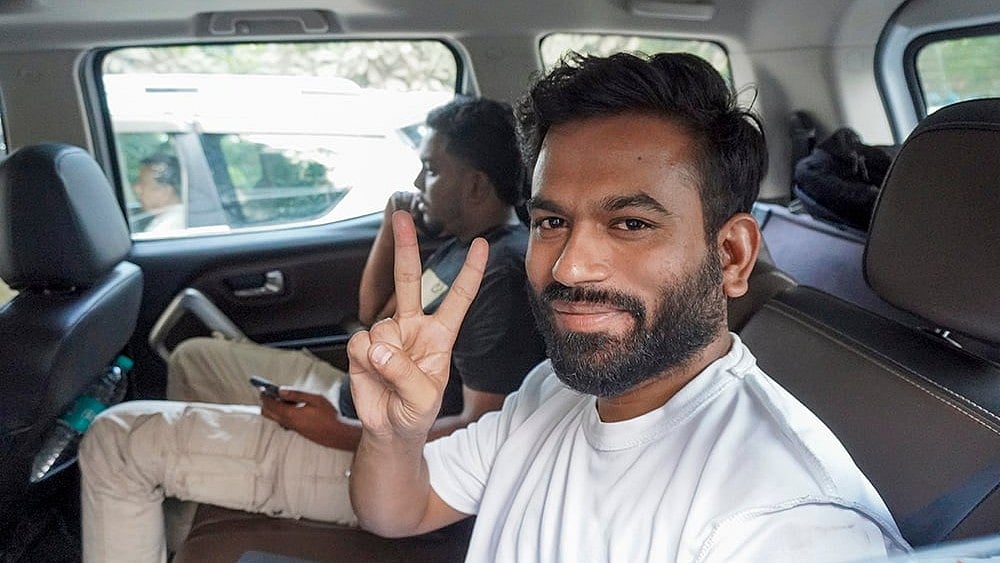 Cockroach Janta Party (CJP) founder Abhijeet Dipke leaves Mandir Marg Police Station after being released on bail, in New Delhi.  - | Photo: PTI 