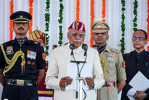 Newly appointed Governor of Uttarakhand Dhal Singh Bisen takes the oath of office at Raj Bhavan, in Dehradun. 
