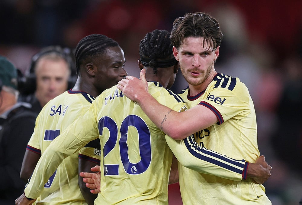 Arsenal's Declan Rice, right, and Arsenal's Noni Madueke celebrates after the English Premier League soccer match between Nottingham Forest and Arsenal in Nottingham, England, Sunday, Oct. 18, 2026.  - | Photo: AP/Maddy Grassy