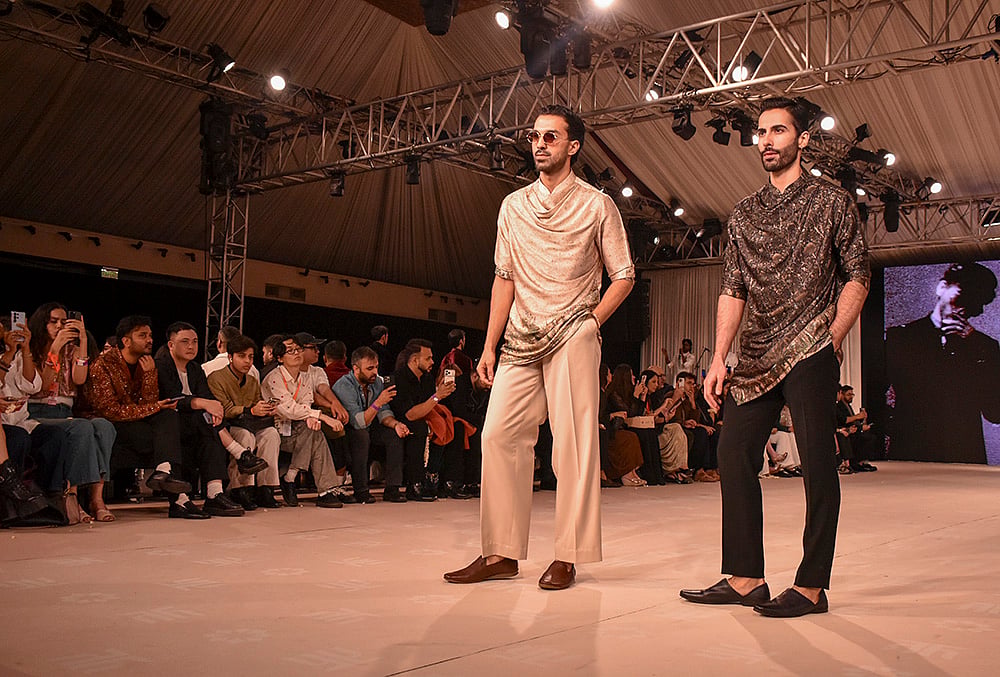 Models walk the ramp as showstoppers for designer Tarun Tahiliani