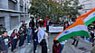 ‘Spare India From Anarchy’: 400-Plus Indian-Origin Academics, Students Urge Protection Of Constitutional Democracy Representative image | Photo: PTI : SFI-UK members protest in London, demanding electoral integrity and Gyanesh Kumar’s resignation.