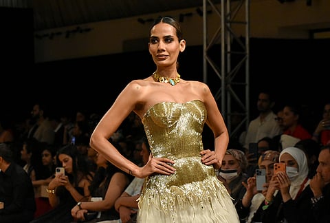 A model presents a creation by designer Samant Chauhan during the Lakme Fashion Week x FDCI, in New Delhi, Thursday, Oct. 15, 2026. 
