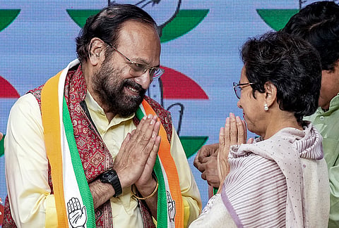 AICC General Secretary in-charge for Uttarakhand Kumari Selja greets senior leader Ramsharan Nautiyal as he officially joins the Indian National Congress, in New Delhi.
