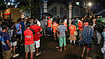 Photo: PTI : Volunteers and people gather outside the Durga Puja pandal following a stampede-like situation