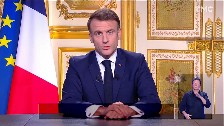 French President Emmanuel Macron delivers a televised address from the Élysée Palace on October 18, 2026, calling for calm and order after protests escalated into violence and looting across France. - | Élysée Palace