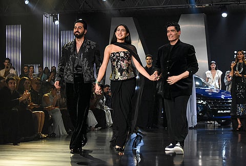 Actors Aayushman Khurana, Sara Ali Khan and designer Manish Malhotra during Lakme Fashion Week, in New Delhi, Saturday, Oct. 17, 2026. 
