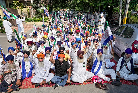 Kisan Mazdoor Sangharsh Committee (KMSC) farmers raise slogans as they protest outside the residence of Punjab Minister Harbhajan Singh against the  killing of anti drugs activist Parvinder Singh Jhota and other demands, in Amritsar.

