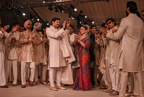 Bollywood actor Ali Fazal and others on the ramp as showstoppers for designer Tarun Tahiliani during the Lakme Fashion Week x FDCI, in New Delhi, late Thursday, Oct. 15, 2026. 
