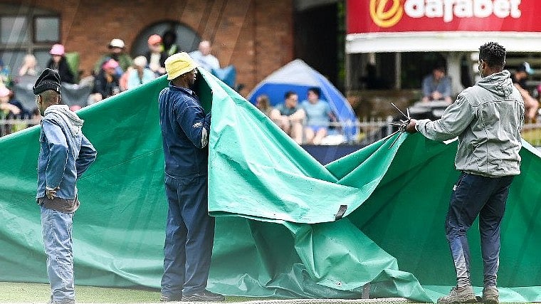Ground staff removing the covers from the pitch - | Photo: X/ProteasMen