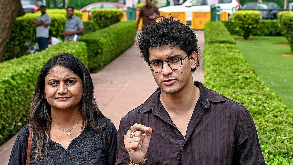 Cockroach Janta Party (CJP) national spokesperson Saurabh Das, right, along with party leader Ratna Singh during a press conference outside the Supreme Court, in New Delhi. - | Photo: PTI
