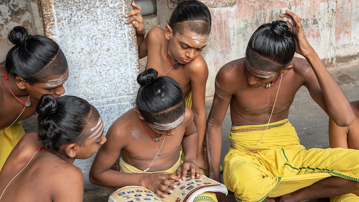 Students studying Vedas and Sanskrit in a traditional Brahmin school in Madurai - Parikh Mahendra N/Shutterstock.com
