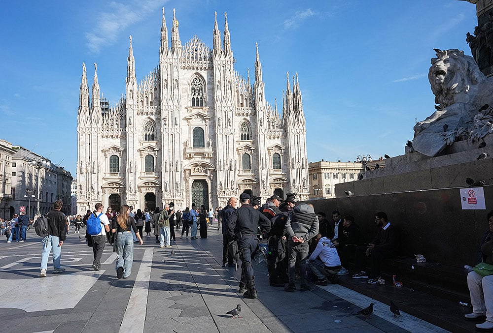 Milan shops boarded up after looting
