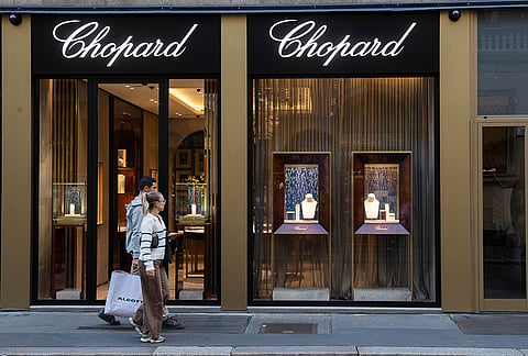 Luxury shops remain closed with windows emptied in Via Monte Napoleone street a day after rioters clashed with police, looted stores and set property on fire, in Milan, Italy, Monday, Oct. 19, 2026.
