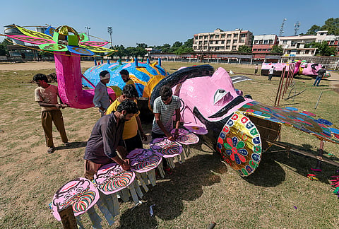 Artisans assemble an effigy of demon king Ravana ahead of the Dussehra festival, in Jammu, Monday, Oct. 19, 2026. 
