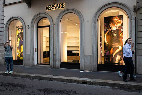 Luxury shops remain closed with windows emptied in Via Monte Napoleone street a day after rioters clashed with police, looted stores and set property on fire, in Milan, Italy, Monday, Oct. 19, 2026.
