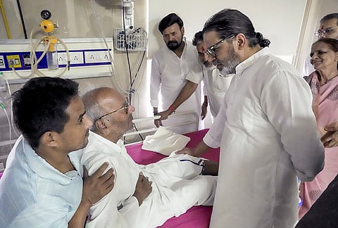 Jan Suraaj Party chief Prashant Kishor interacts with senior JD(U) leader Bashistha Narain Singh to enquire about his health, at Indira Gandhi Institute of Medical Sciences (IGIMS), in Patna, Bihar.