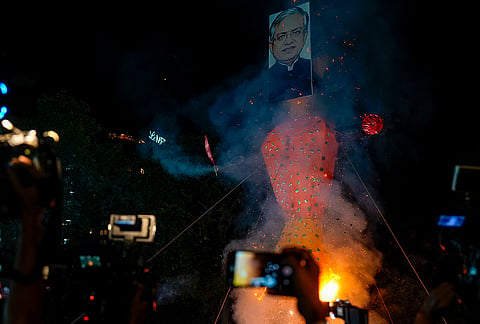 Indian Youth Congress (IYC) members burn an effigy during a protest titled “Vote Chori Ki Raasleela”, at the IYC office in New Delhi, Monday, Oct. 19, 2026. 
