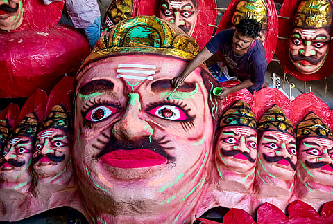 An artist works on an effigy of Ravana ahead of the Dussehra festival, in Nagpur, Maharashtra, Thursday, Oct. 15, 2026. 
