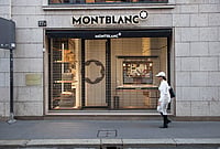 In Photos: Milan Luxury Shops Shut Amid Protests And Unrest In Italy | Photo: Marco Ottico/LaPresse via AP : Luxury shops remain closed with windows emptied in Via Monte Napoleone street a day after rioters clashed with police, looted stores and set property on fire, in Milan, Italy, Monday, Oct. 19, 2026.