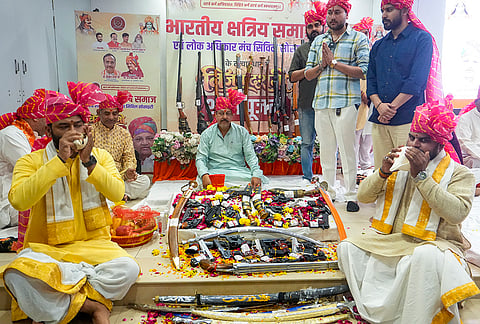 People perform Shahstra Puja organised by bharatiya kshatriya samaj and lok adhikar manch civil society during Vijaydashmi festival, in Lucknow, Tuesday, Oct. 20, 2026. 

